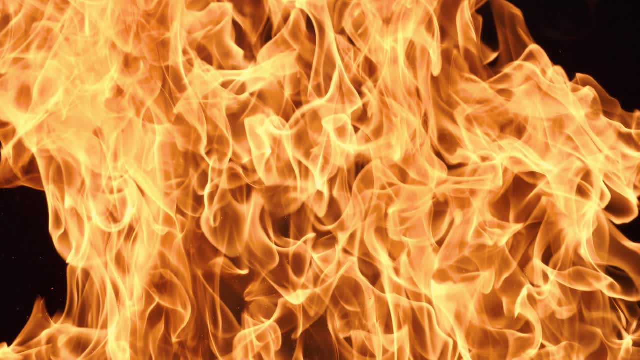 Flames of fire on black background in slow motion. Shot on super slow motion camera 1000 fps.