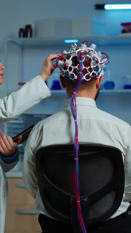neuroscience research: patient undergoing eeg brain activity monitoring