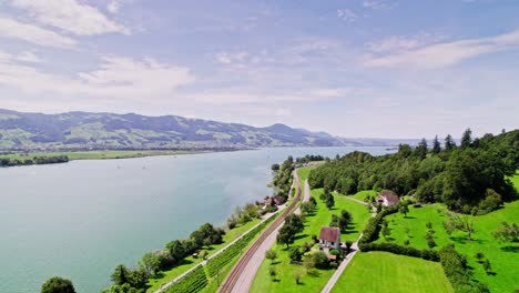 aerial flyover idyllic lake obersee ind idyllic swiss landscape with mountains during summer