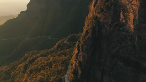 aerial view establishing shot of rainforest brazilian mountain road, serra do corvo branco, grão pará, santa catarina, brazil