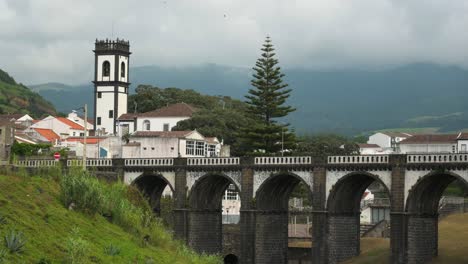 municipality, central square of ribeira grande and the bridge ponte dos oito arcos, at sao miguel island, azores, portugal - july 2023