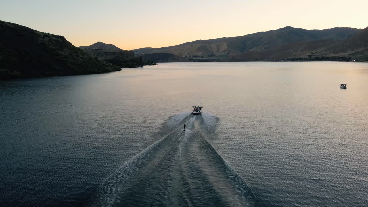 Wakeboarding at sunset on the lake