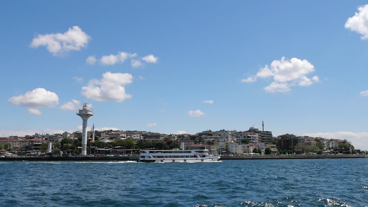 Ferry on the Bosphorus Strait with Istanbul Cityscape
