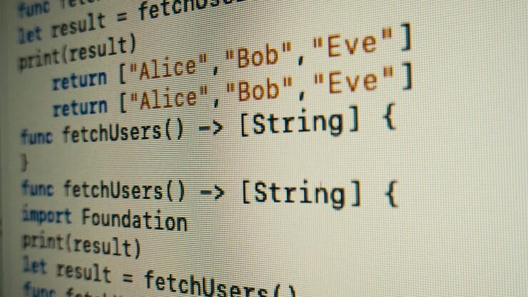 Programming Code Scrolling on a Computer Screen Close-Up