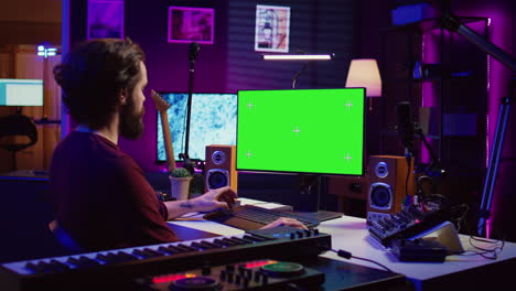music producer learning to use mixing console and soundboard