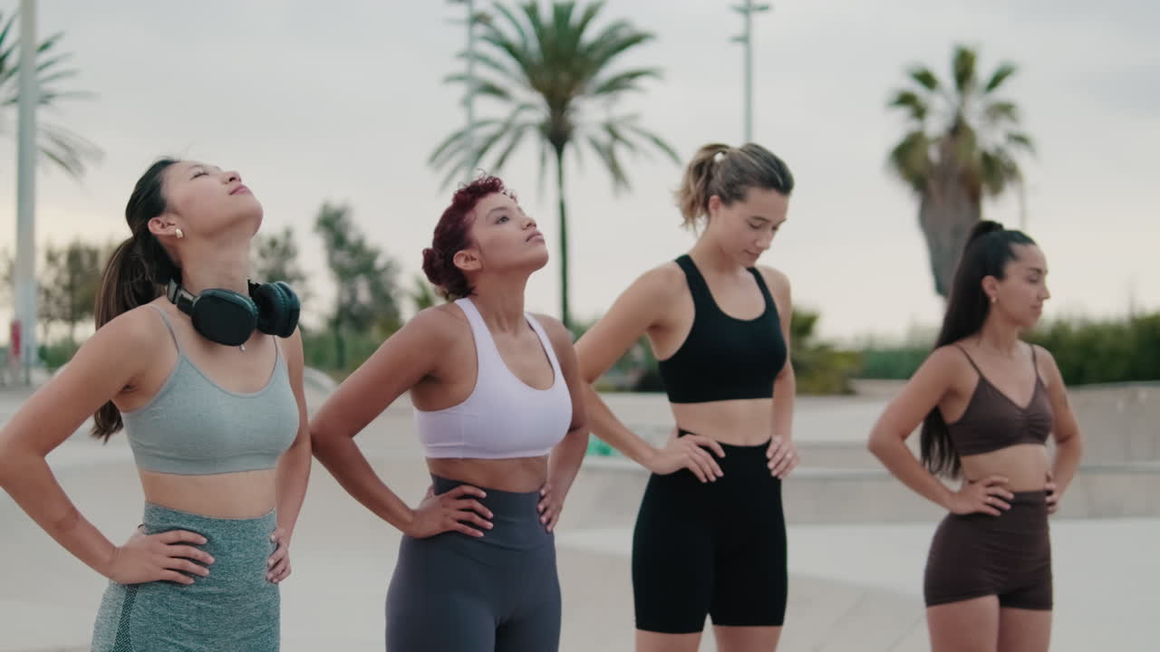 Diverse Women Taking a Fitness Break in the Park
