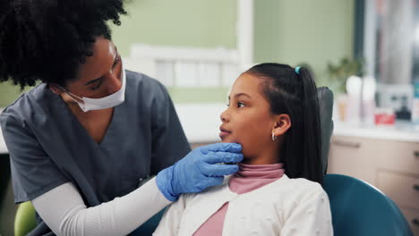 dentist examining a child patient