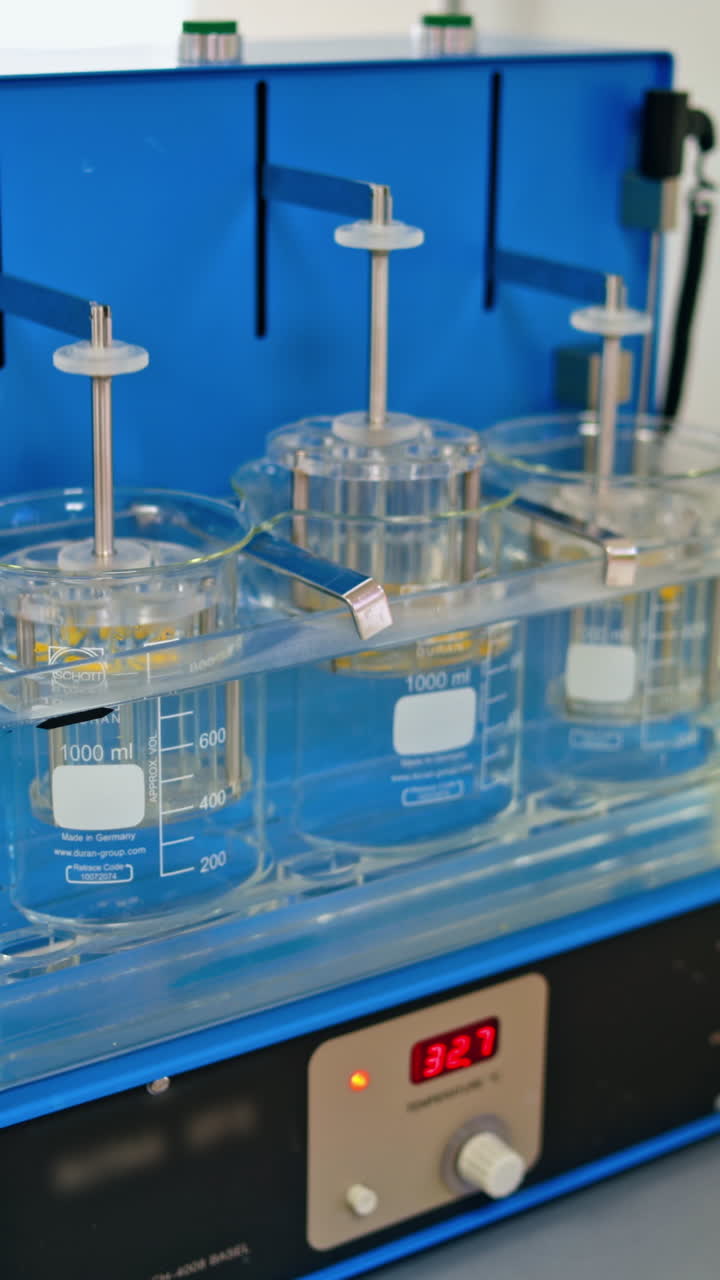 Pharmaceutical factory equipment. Pharmaceutical factory equipment on production line in pharmacy industry manufacture factory. Vertical video