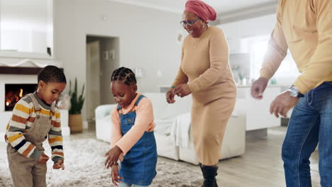 Children,-grandparents-and-family-dancing-in-home