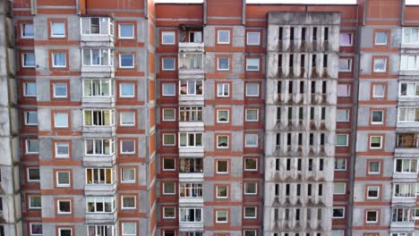 aerial close fly-by of a residential apartment building in klaipeda, lithuania