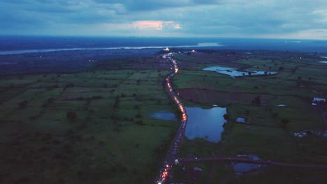 aerial view of huge crowd going for pilgrimage to a hindu temple in rajasthan india during evening time