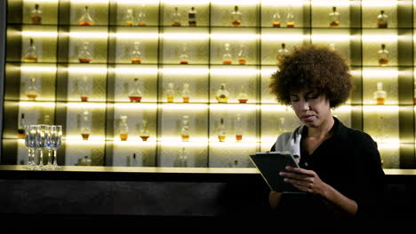 bartender writing on clipboard