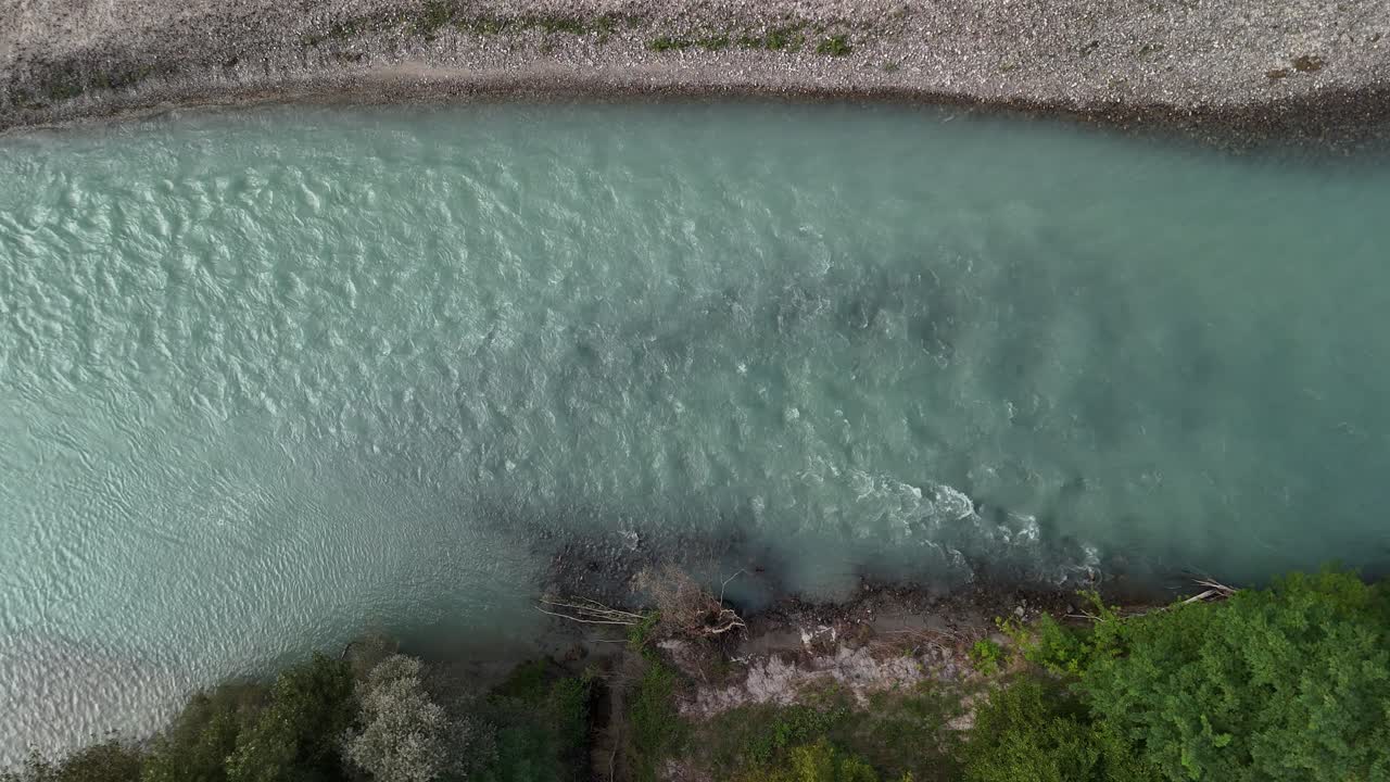 High view of the Toce River stream with turquoise waters