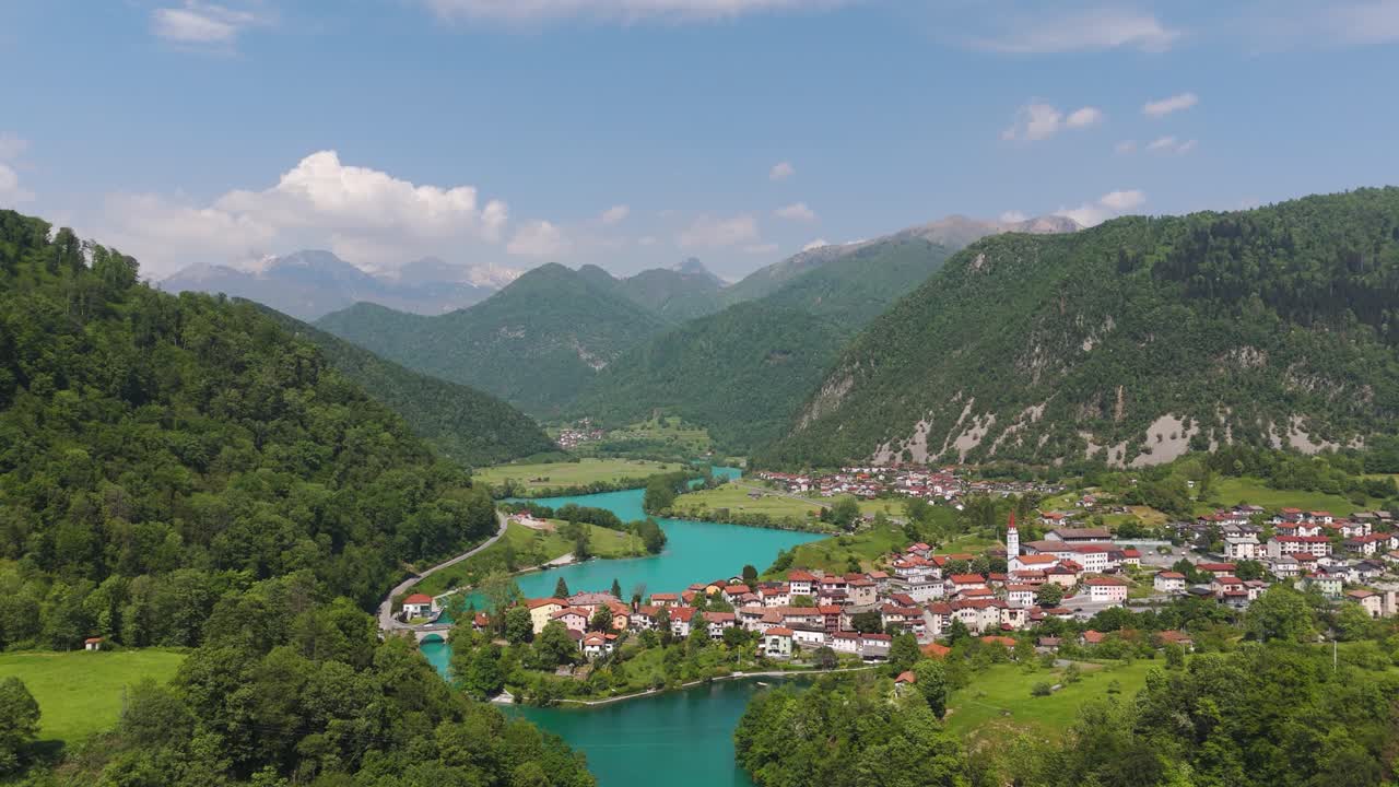 Blue waters flow through Most na Soči village in Slovenia’s scenic mountain valley region