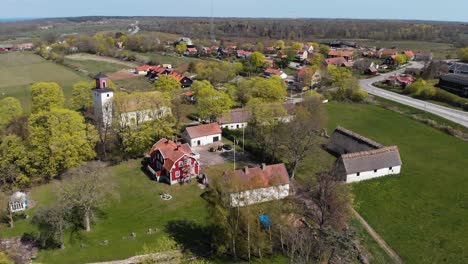 aerial view of quaint swedish town of glomminge prastgard unveils a charming tableau of simplicity and history