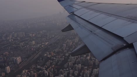 aerial view of mumbai from the window seat of an airplane