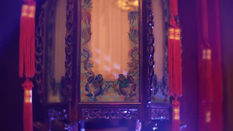 an ornamental chinese shrine lantern in a restaurant