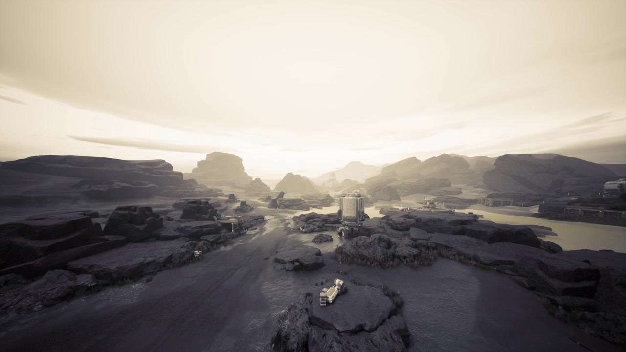 Sunrise casts glow across wide desert with sparse villages and rocky outcrops