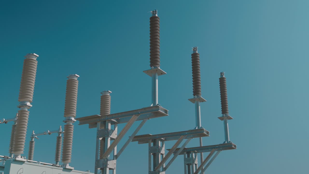 Power station shot in daylight. Industrial, static, solid mood