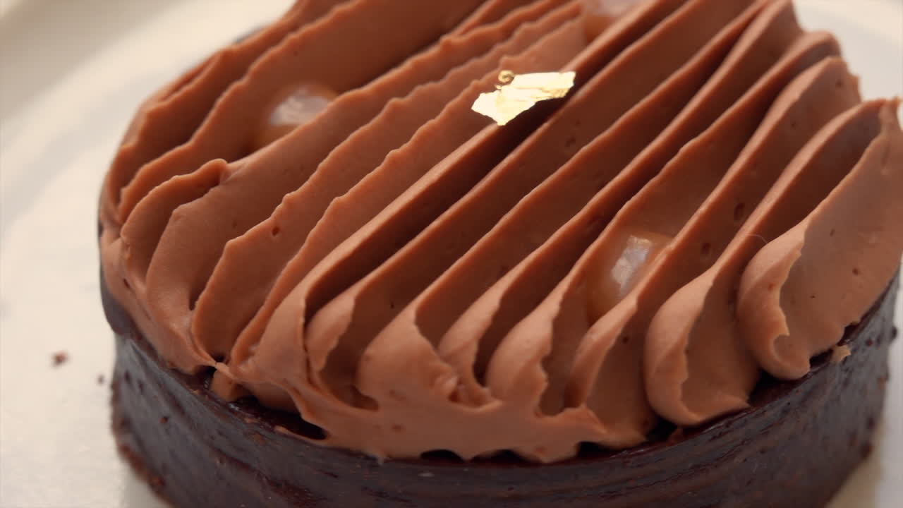 Close up of a chocolate cake with caramel cream