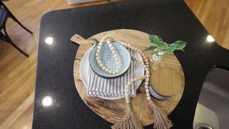 accessories and decorations on a dark kitchen table