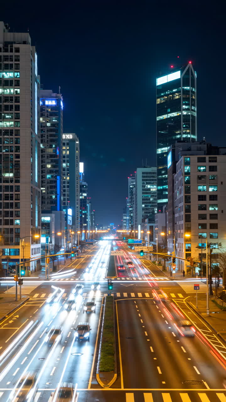 City street at night with light trails and digital network overlay