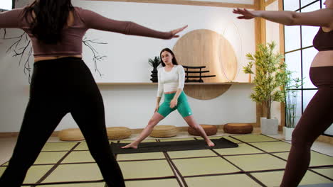 women doing yoga indoors