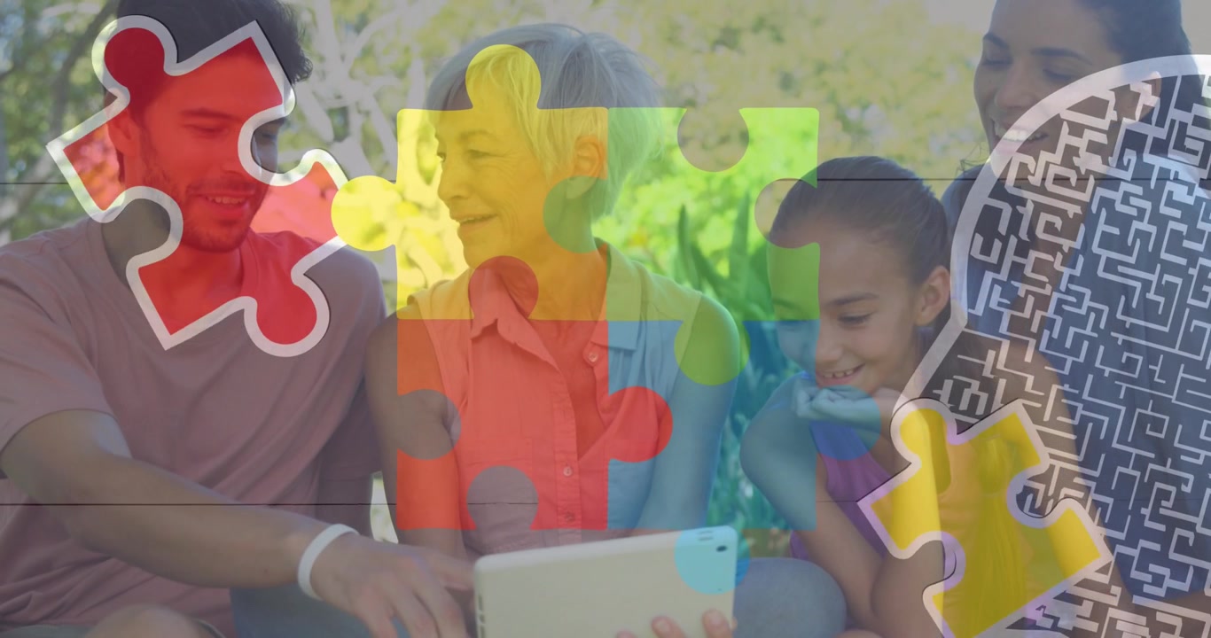 Famiglia multigenerazionale che usa un tablet all'aperto con grafiche sulla consapevolezza dell'autismo
