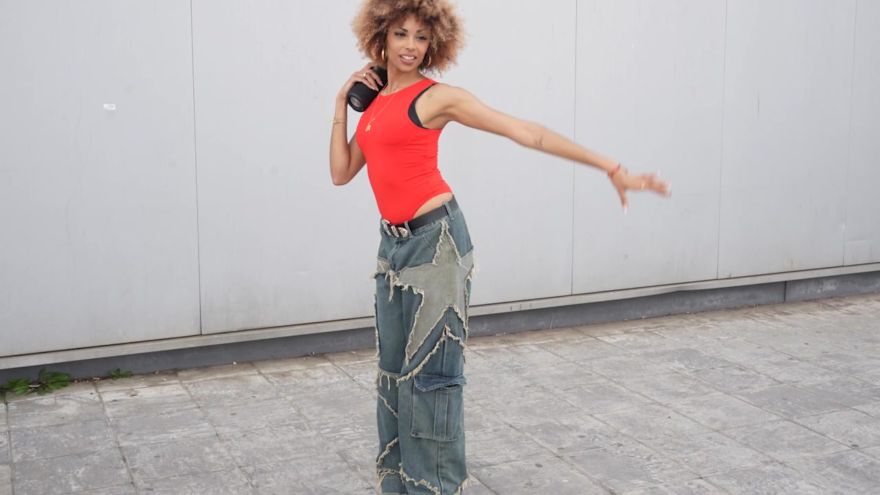 Trendy fashion photo shoot a stylish model posing gracefully in a vibrant urban setting