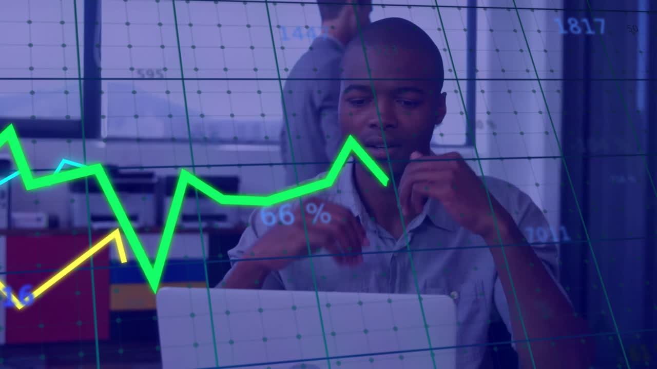 Animation of financial data processing over african american businessman using laptop in office