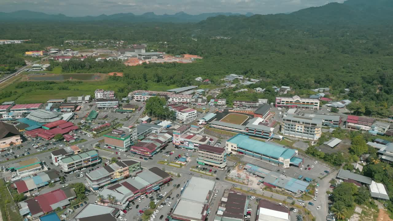 Aerial Drone View, Serian District Town ,Summer With Beautiful Green Trees,New Building And Water Park Lake, Water From The Mountain Sarawak,Borneo.