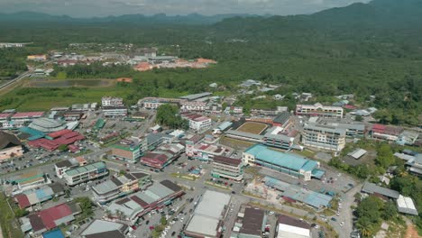 aerial drone view, serian district town ,summer with beautiful green trees,new building and water park lake, water from the mountain sarawak,borneo.