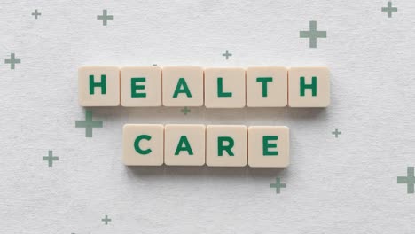 scrabble tile showing health care cost more affordable