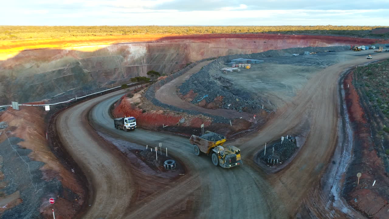 Trucks working on a gold mine