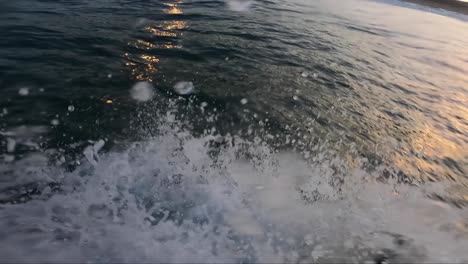 Young-man-riding-perfect-wave-at-Guincho-surf-spot-in-Cascais