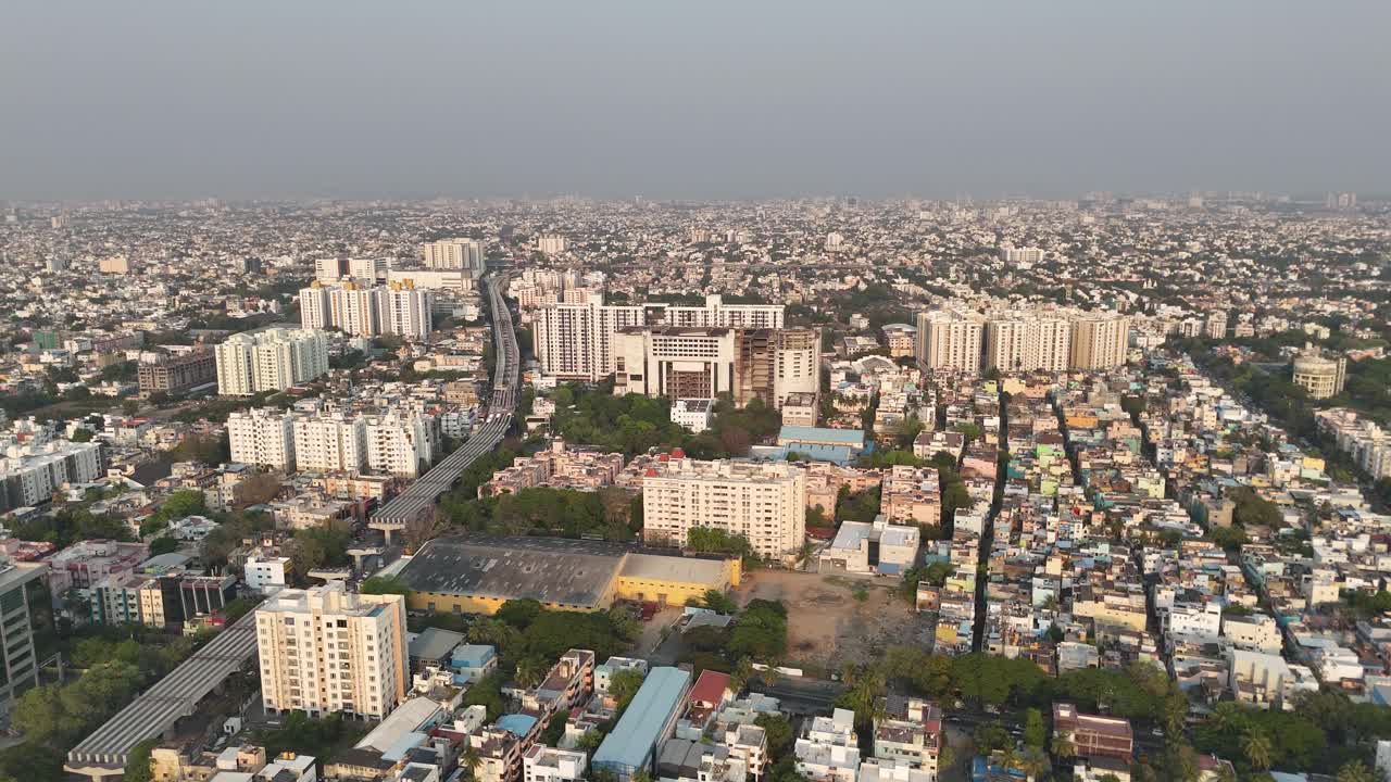 Smooth traffic and structural expansion visible in a suburban skyline.