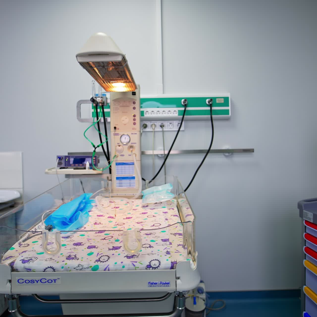 New modern technological equipment for reanimation unit. Little crib for newborns resuscitation in a specially organized ward