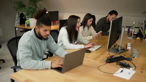 team at office celebrate goals and target at startup or project achievement