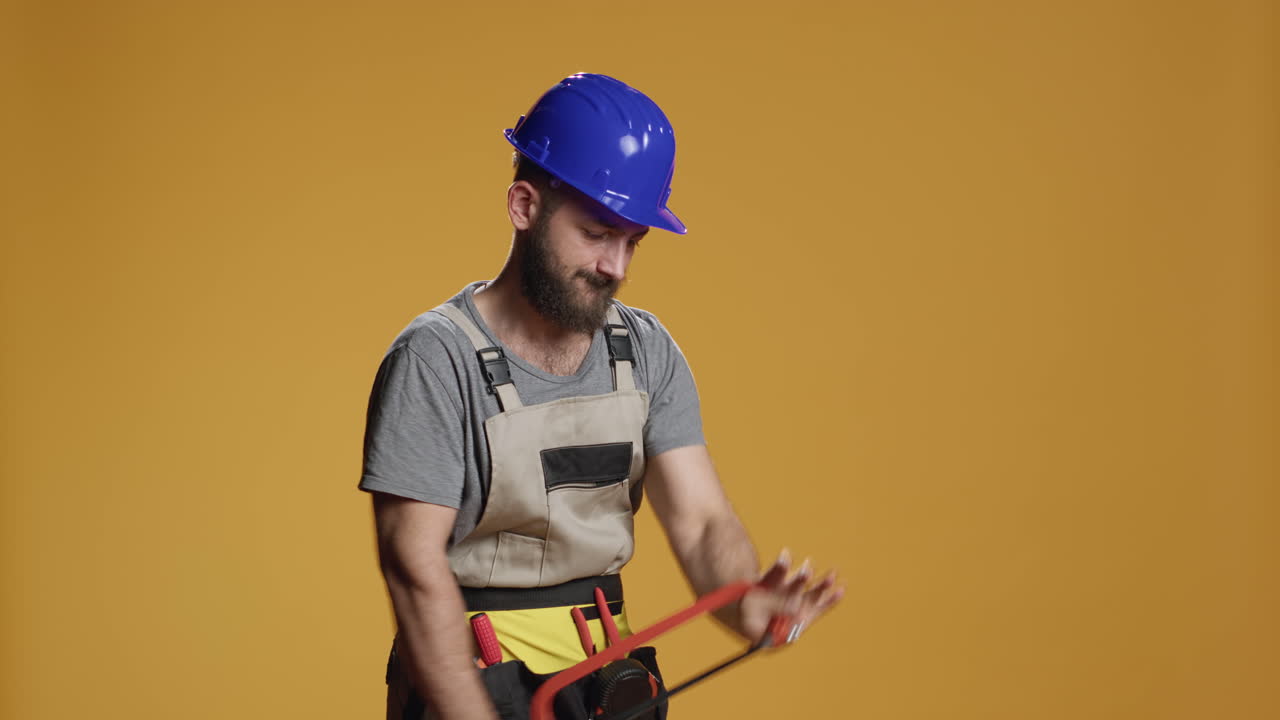 Handyman mechanic using saw with razor used for chopping wood