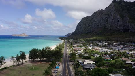 drone shot following hawaii's kalaniana'ole highway following the coastline