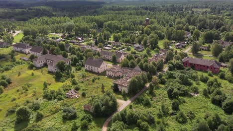 distant drone video of abandoned houses in a lonely village