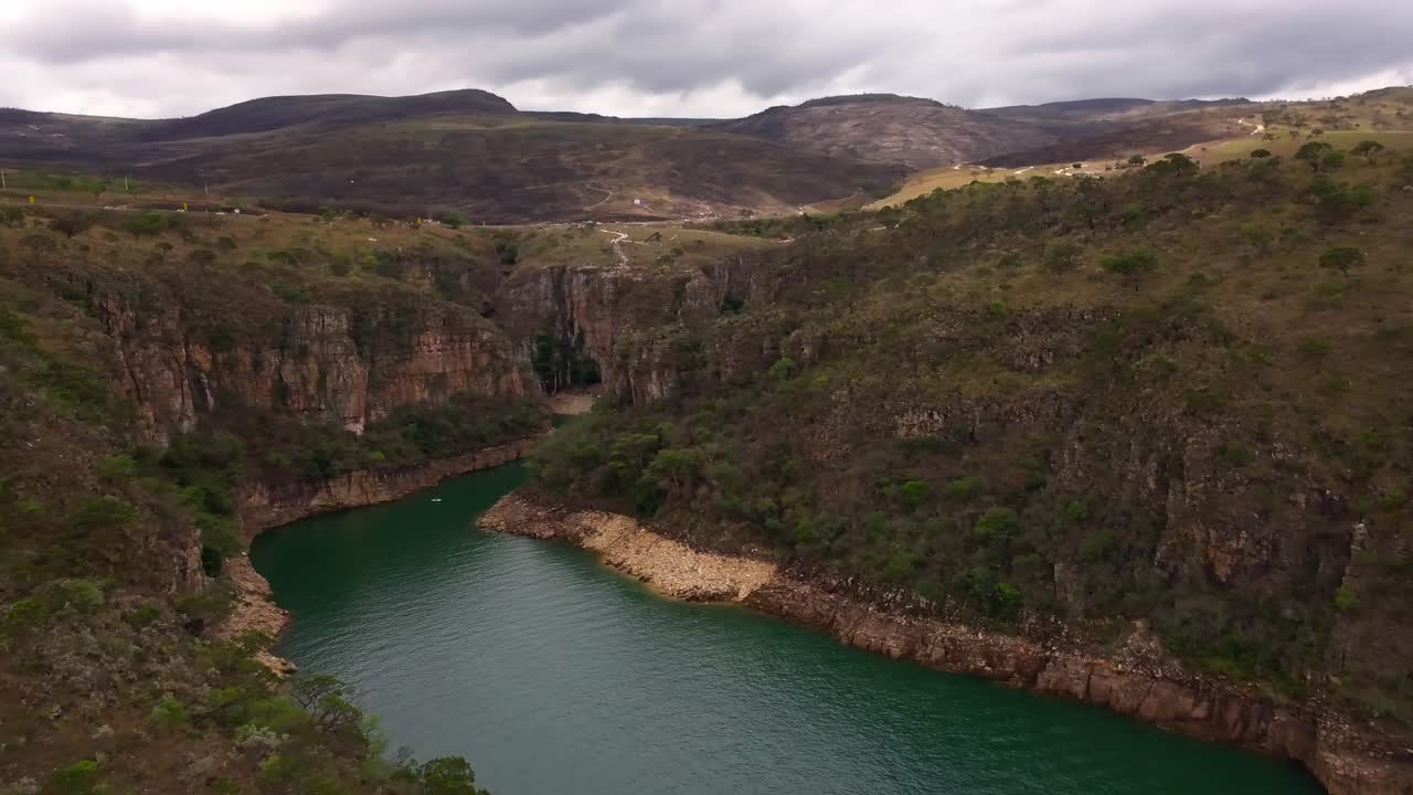 Remote canyon river with cliffs and lush hills in Minas Gerais, Brazil