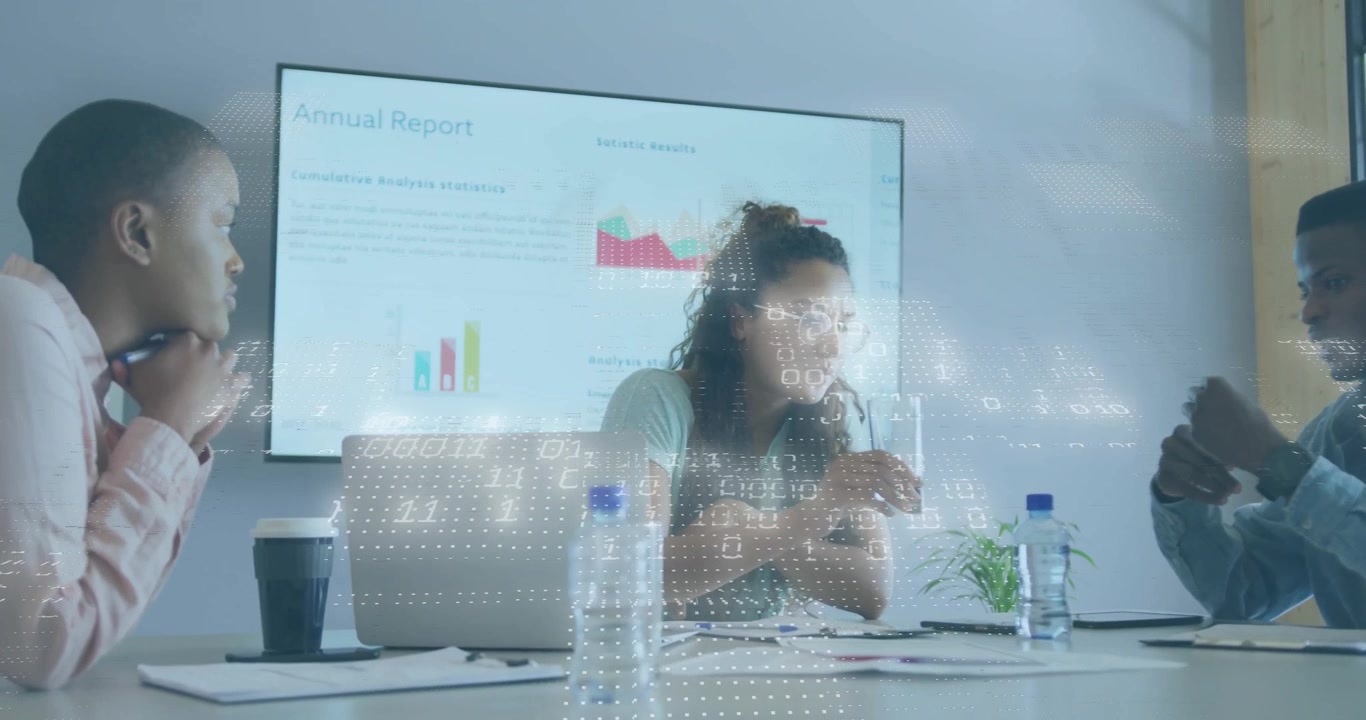 Man gesturing at display triggers animated charts updating data while team discussing annual report