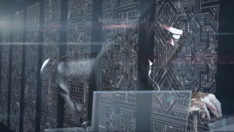 animation of man with a mask hacking computers