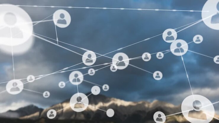 Animation of network of connections with people icons over landscape