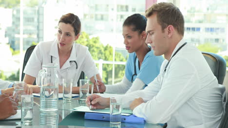 team of smiling doctors having a meeting