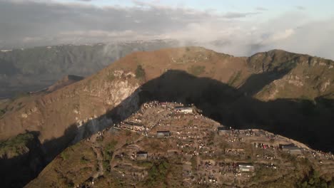 massive mount batur volcano crater draws crowds of people at sunrise