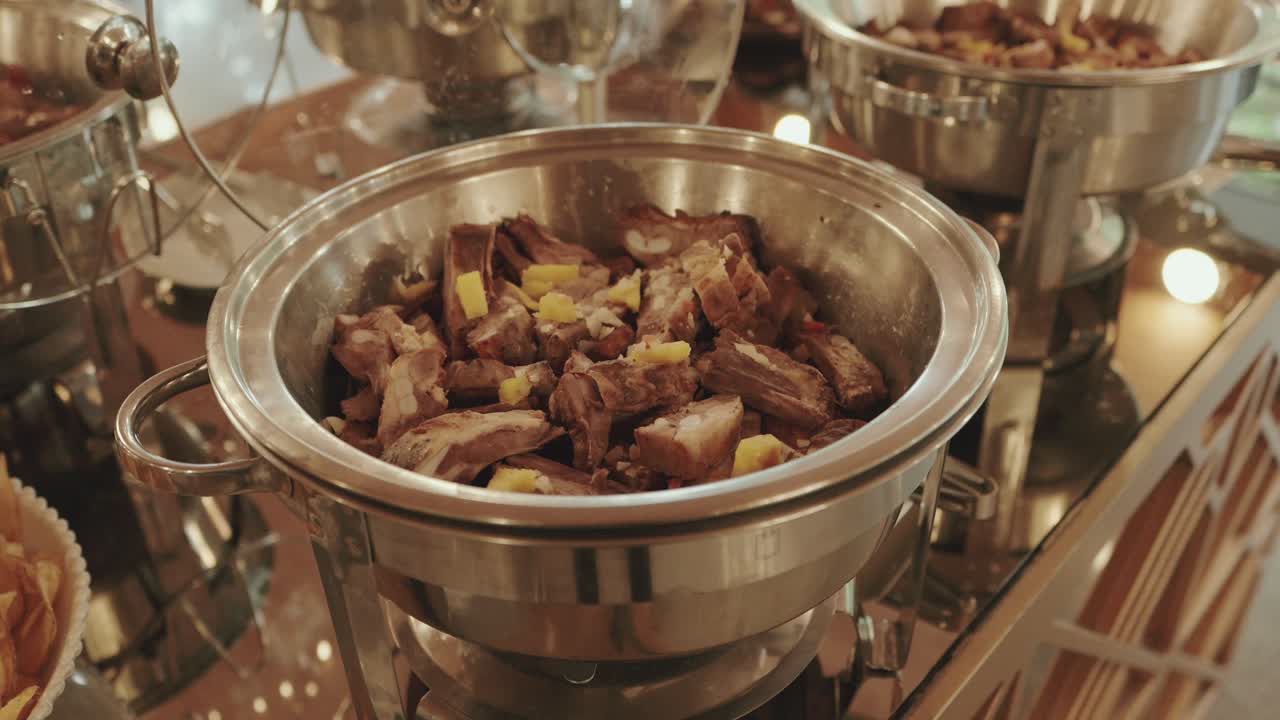 slow cooked meat served warm in elegant food station for buffet service