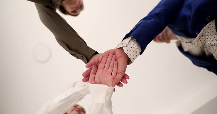 Teamwork and collaboration shine in a heartwarming moment of unity and support among friends