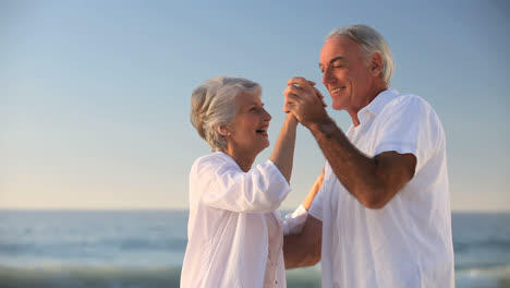 Elderly-woman-dancing-with-her-husband